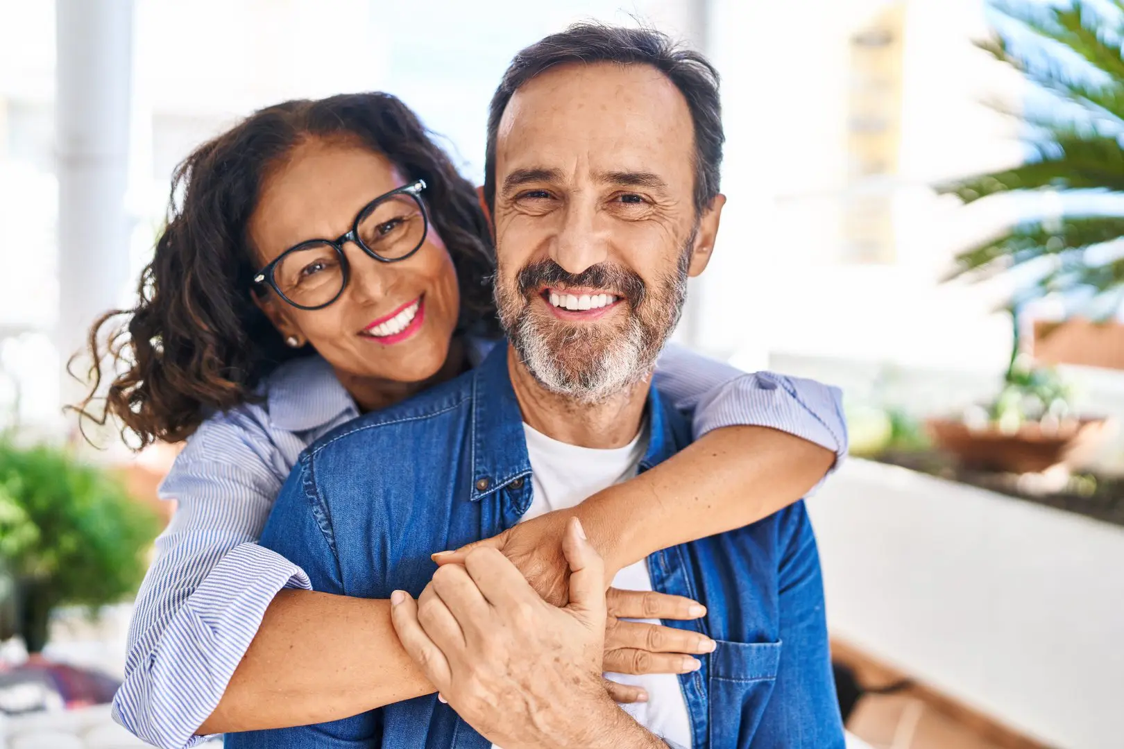 Joyful partners hugging with love