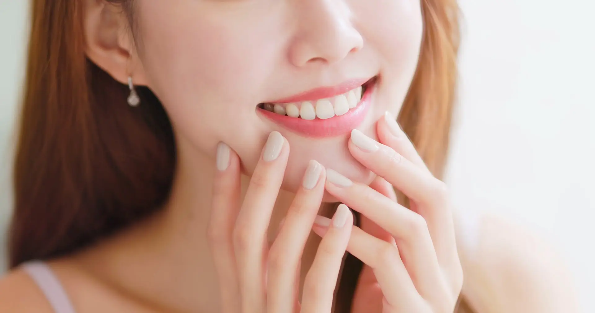 Smiling woman with perfect white teeth