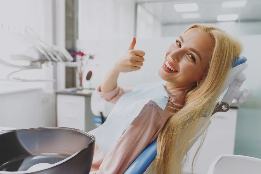Happy patient giving thumbs up