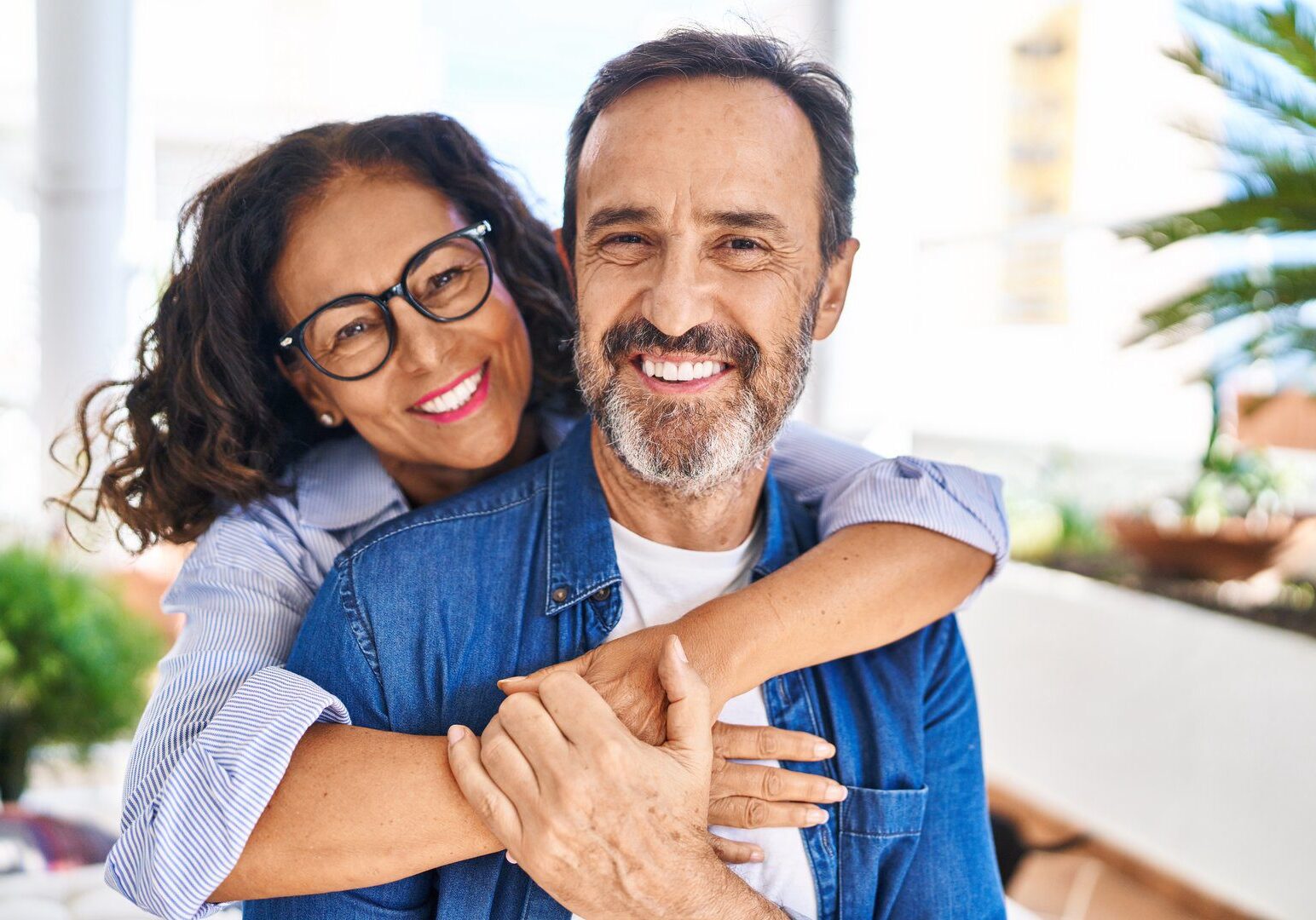 Joyful partners hugging with love