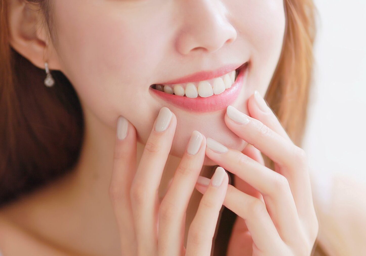 Smiling woman with perfect white teeth