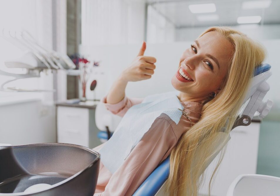 Happy patient giving thumbs up